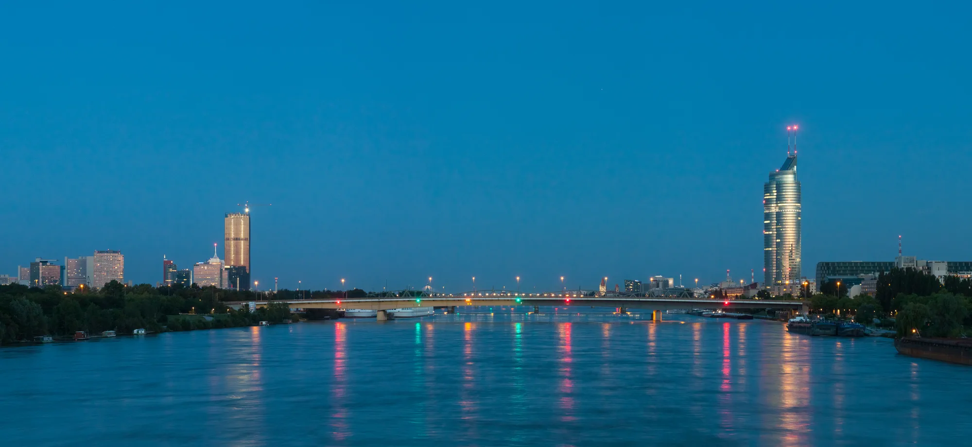 Vienna skyline and the Danube at blue hour
